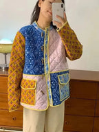 Handgefertigte Baumwoll-Patchwork-Steppjacke – Gelb mit Blumenmuster und Marineblau